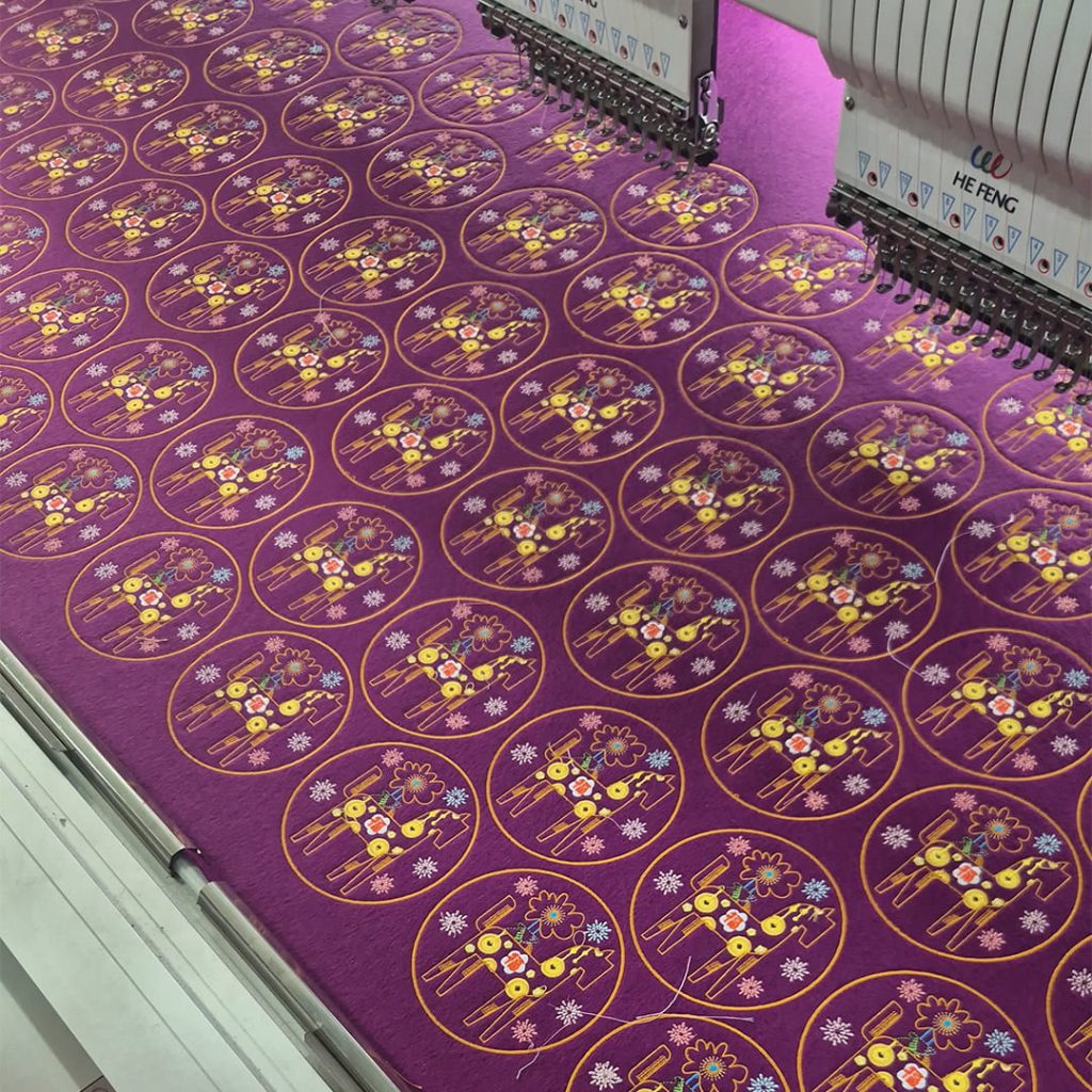 scout badges being embroidered